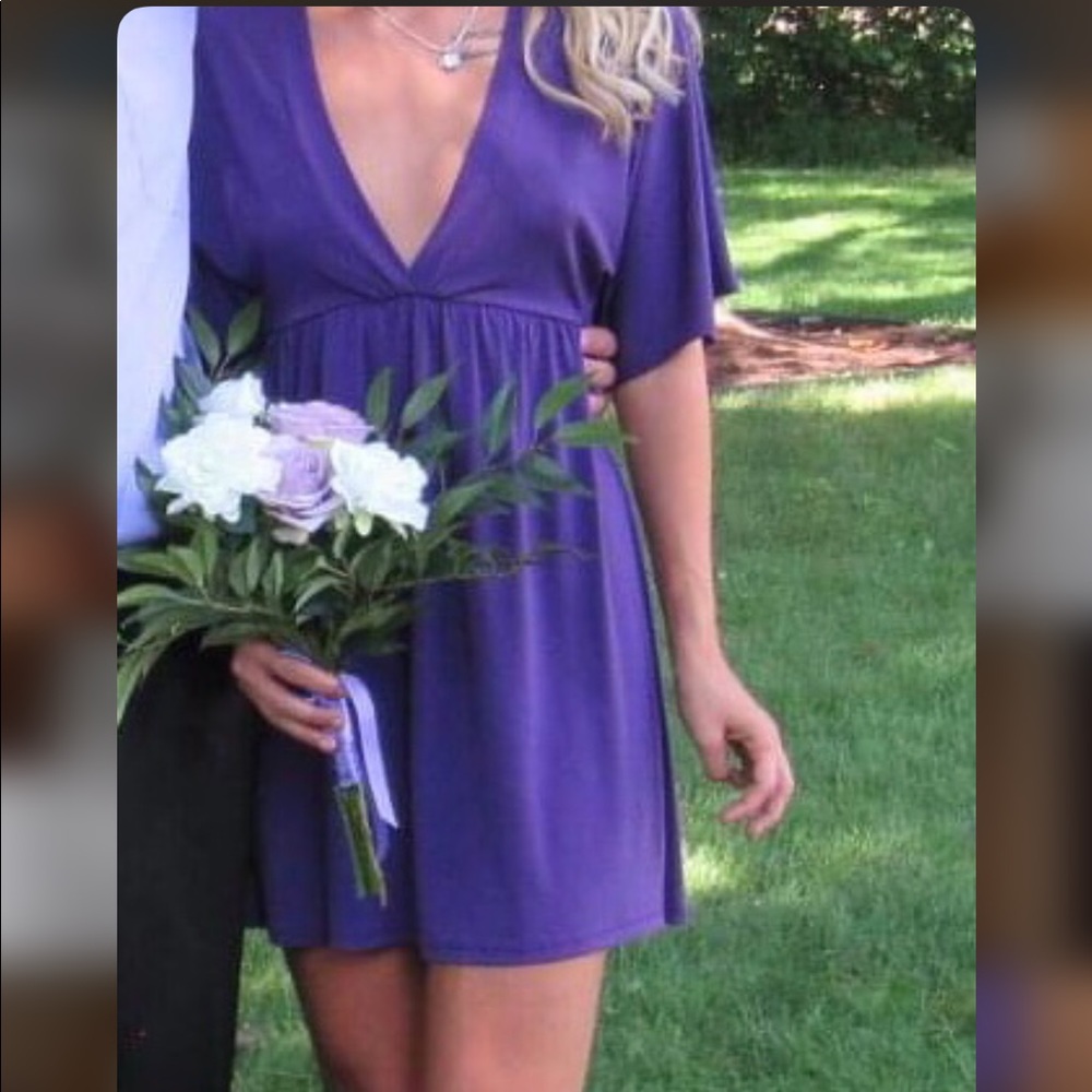 Classy/sassy low cut purple dress